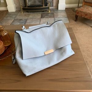 Elegant Slouchy Blue Leather Women's Bag with Metal Details